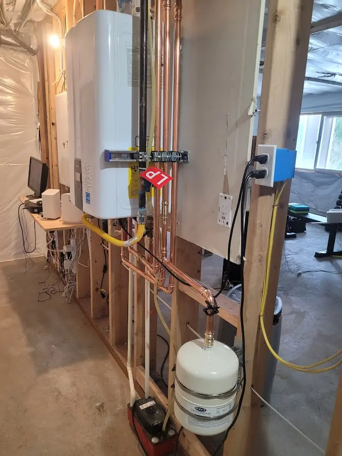 Licensed plumber repairing a kitchen sink in Roseville
